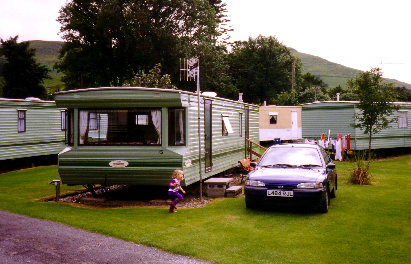 * Classic Cymru - Tynllwyn Caravan Park, Rhydyronen - A young Helen runs around our rented caravan - 1998 (by AJW) *