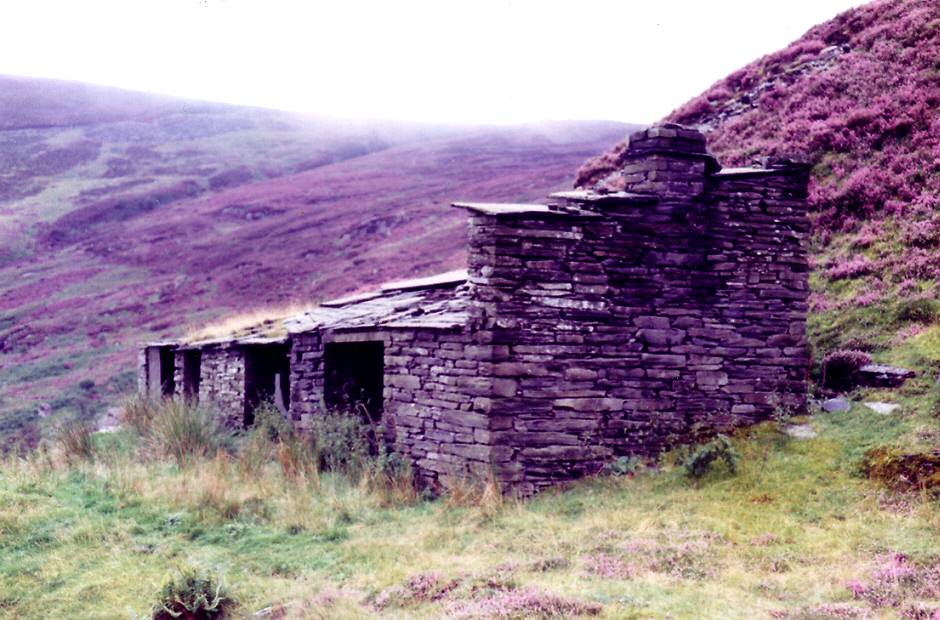 * [Pic 8] Cwm Machno Quarry - Wal on upper workings (Aug 1982) *