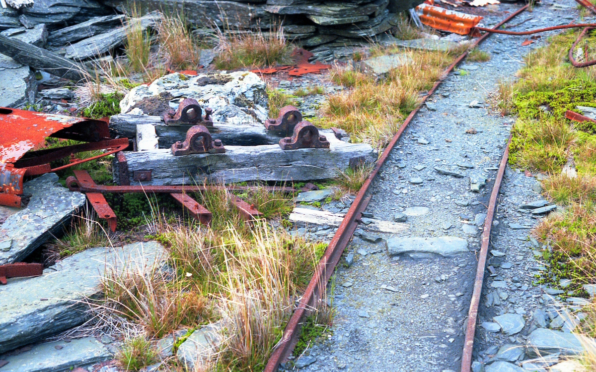 * [Pic 10] Cwt y Bugail Slate Quarry - Rails and a wagon (Sept 1987) *